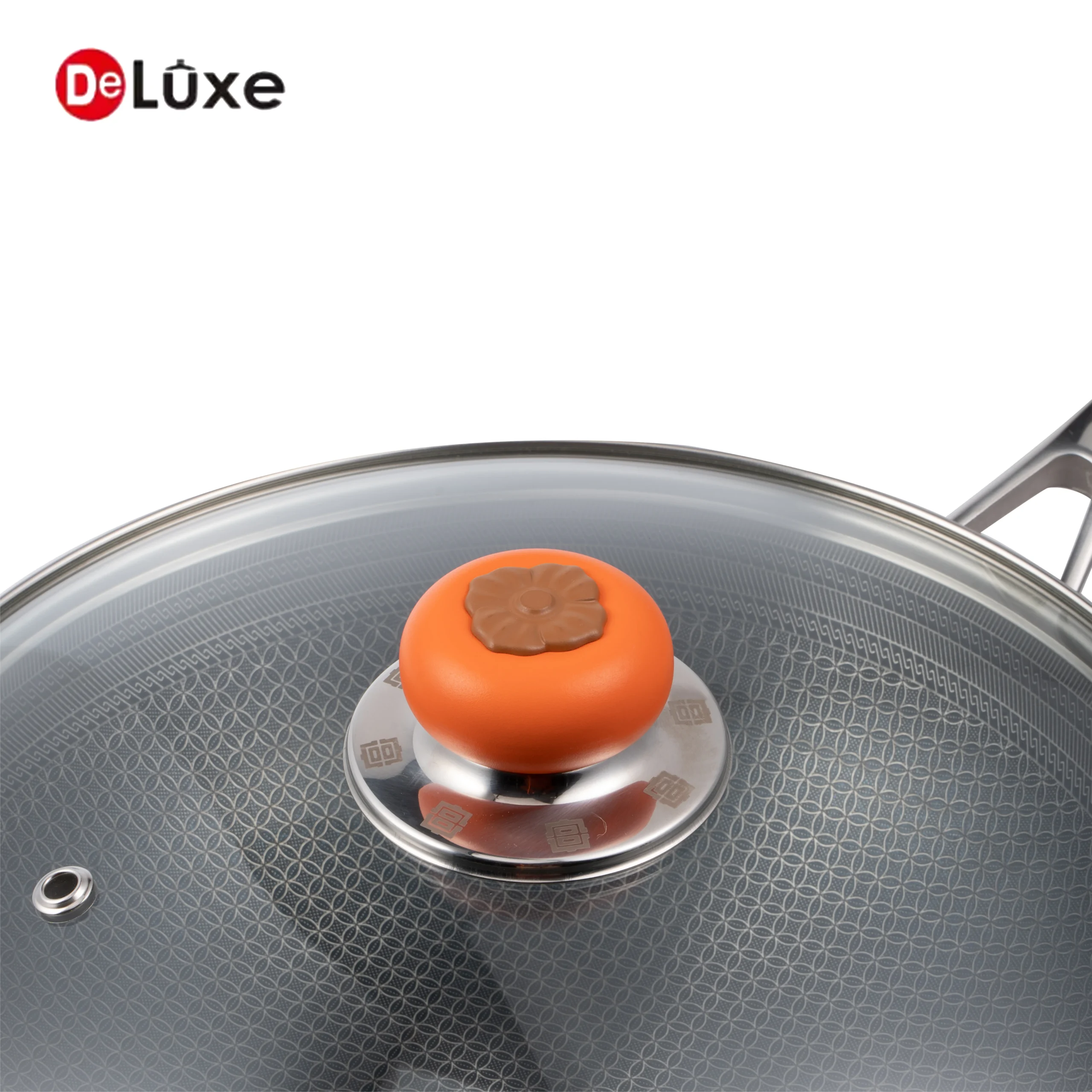 Close view of orange heat insulation silicone knob on wok tempered glass lid