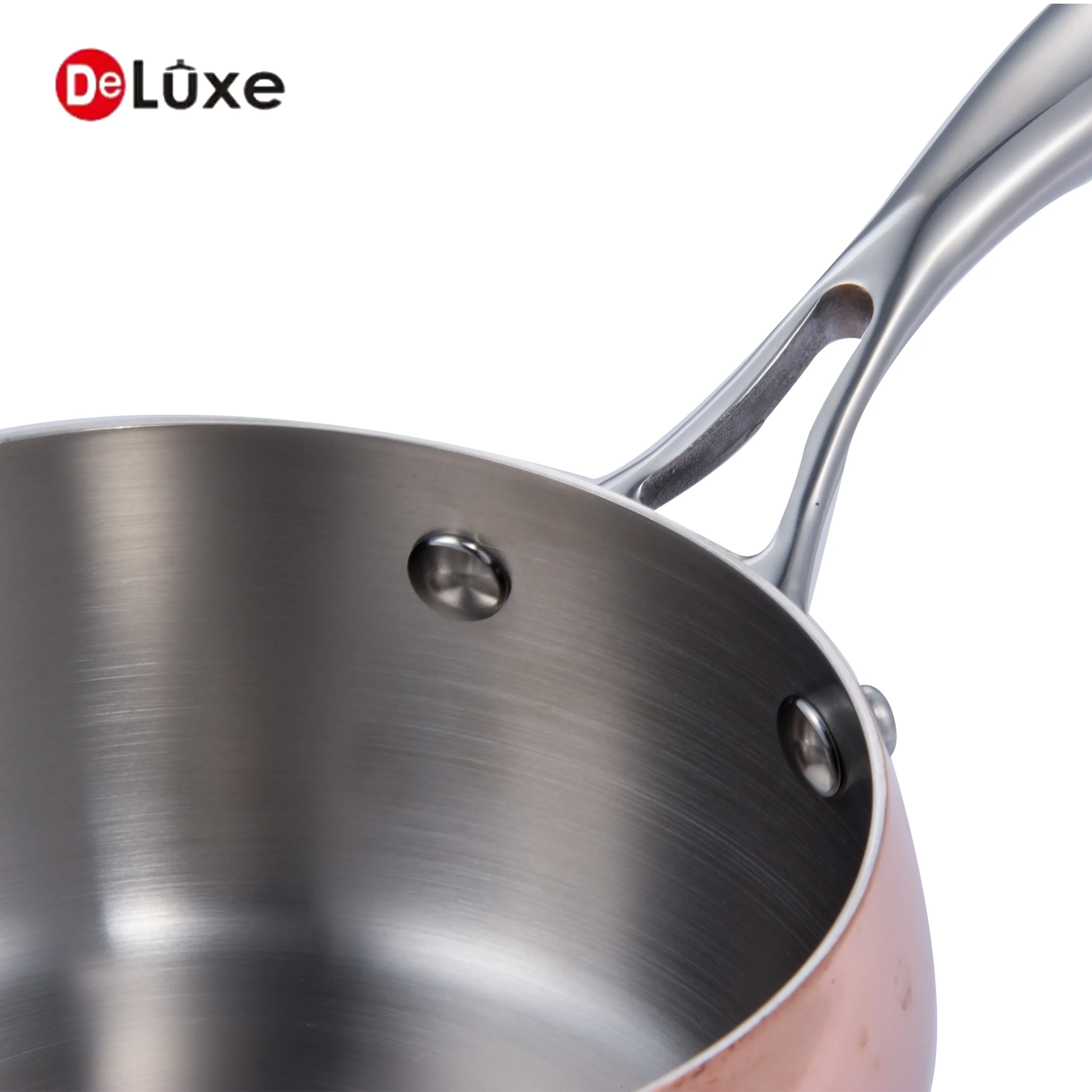 Close-up of interior and solid cast steel handle on composite copper small saucepan