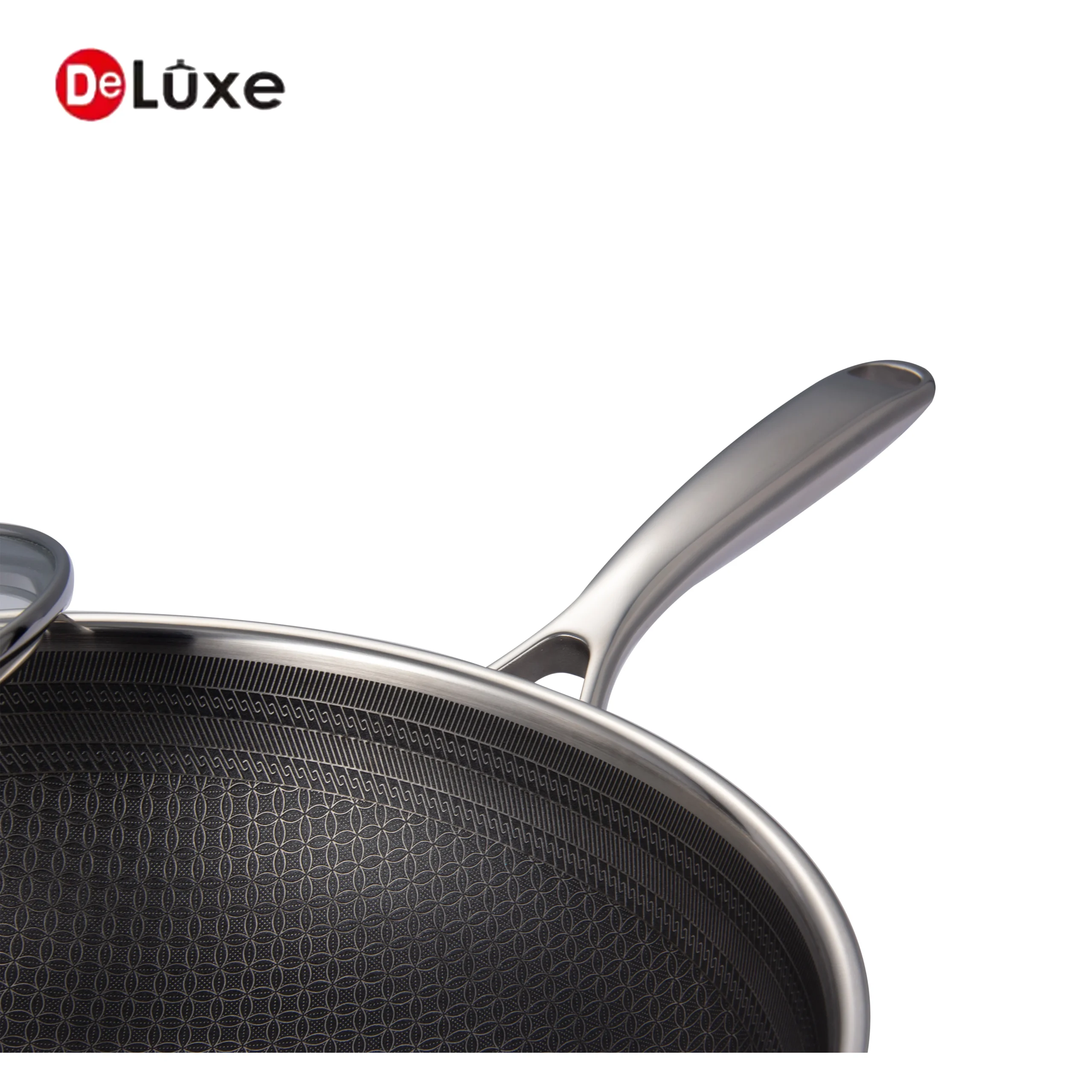 Detail shot of Deluxe wok honeycomb interior, polished hollow cast steel main handle