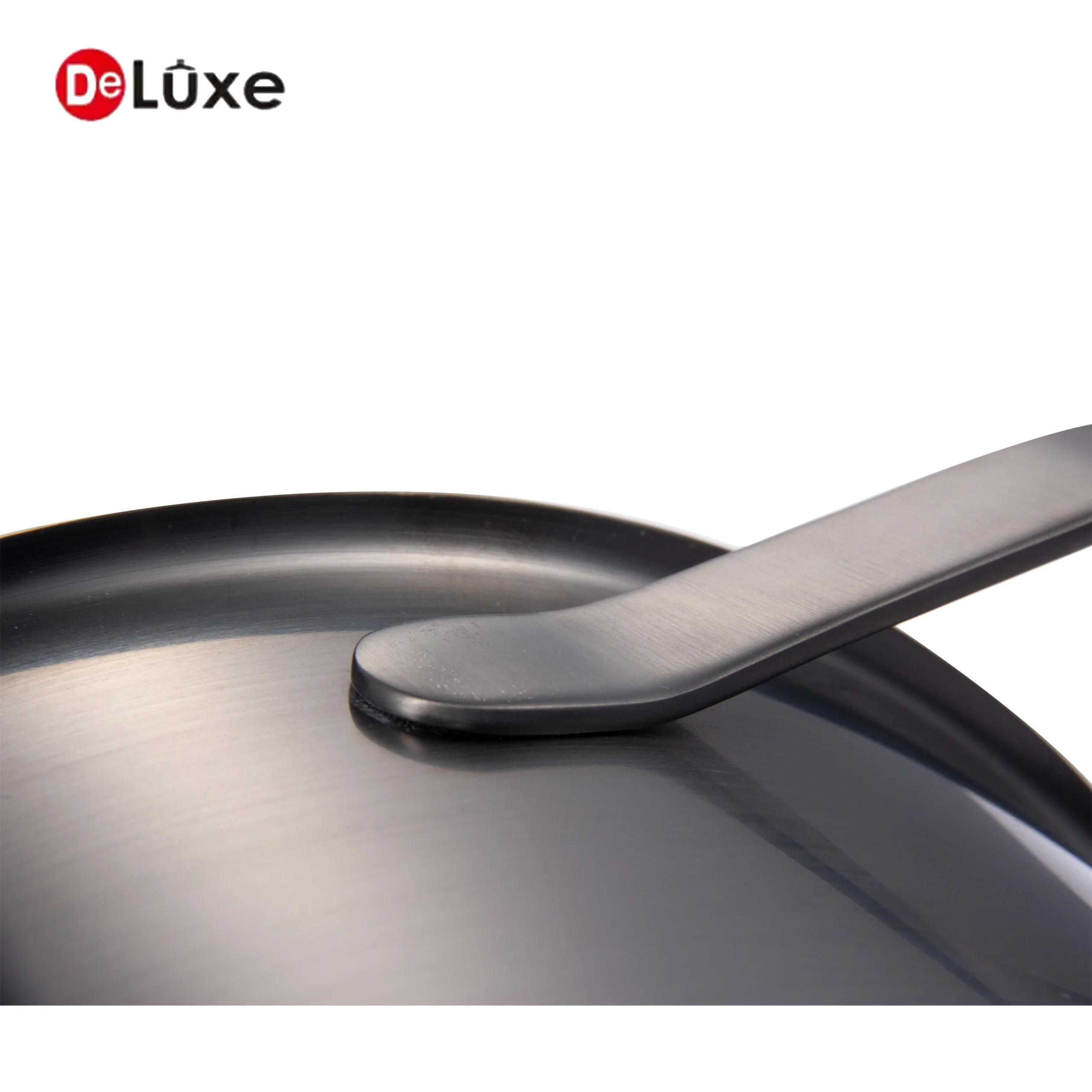 Close-up of matte sandblasted full black PVD surface on exclusive ribbon curved cookware lid