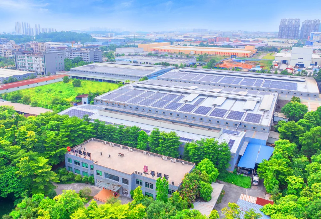 DeLuxe Metal cookware factory aerial view, rooftop solar panel photovoltaic system for eco-friendly green production