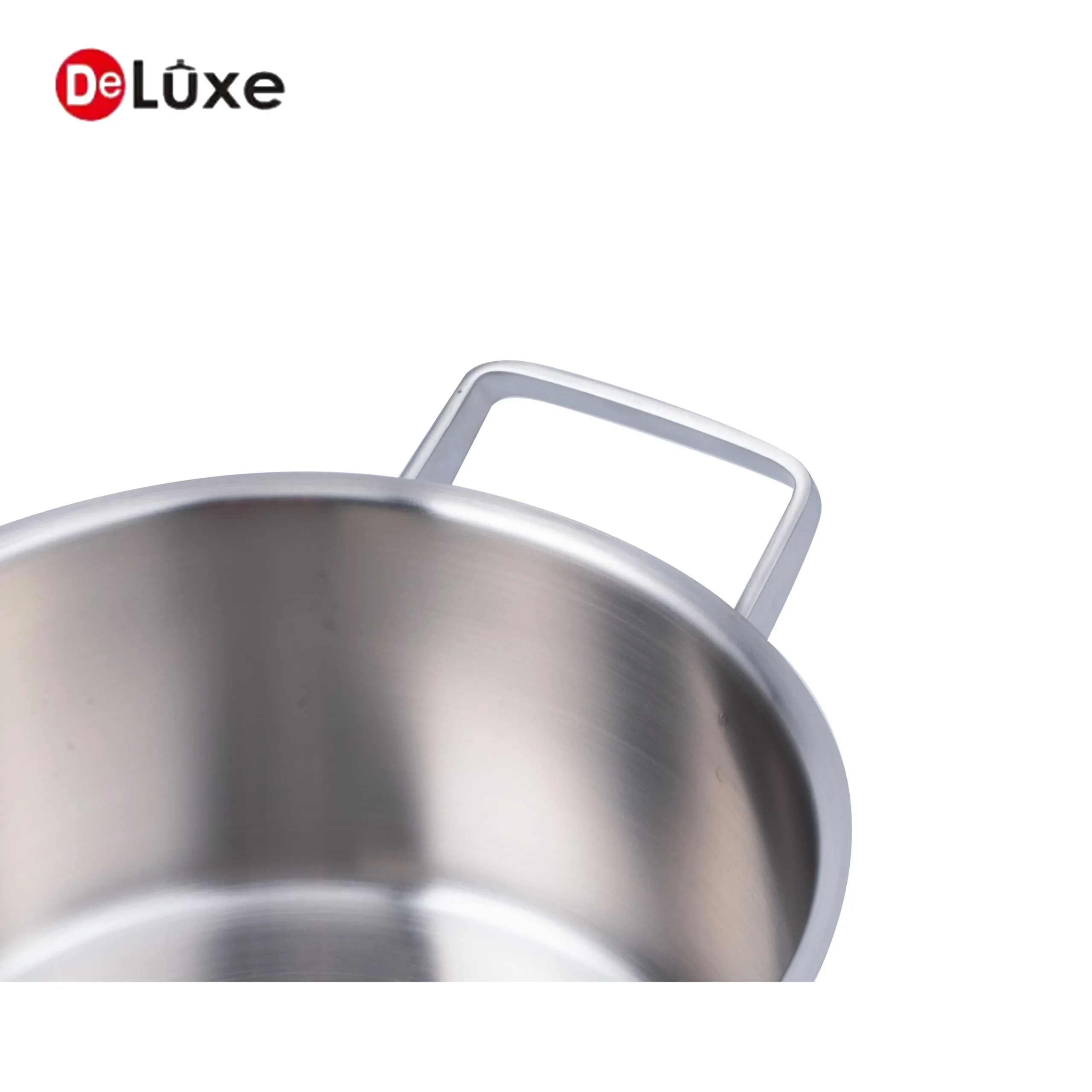 Close-up of dual integrated pouring spout and spot welded cast steel double handle on stainless stock pot