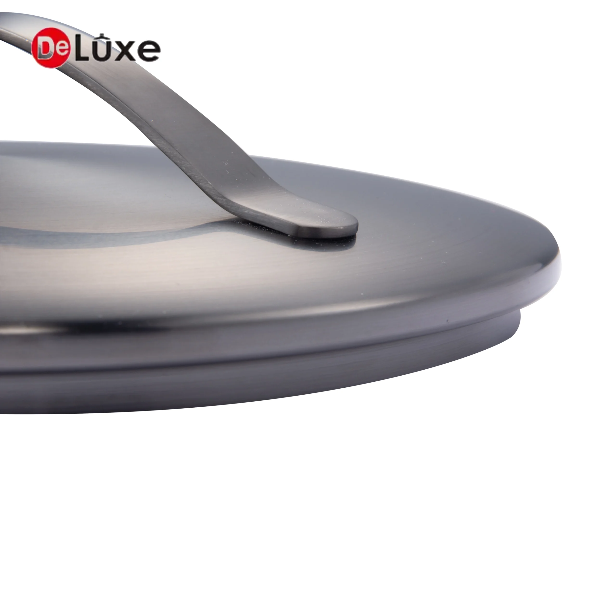 Detail close-up of exclusive streamline ribbon curved handle on full black sandblasted PVD lid